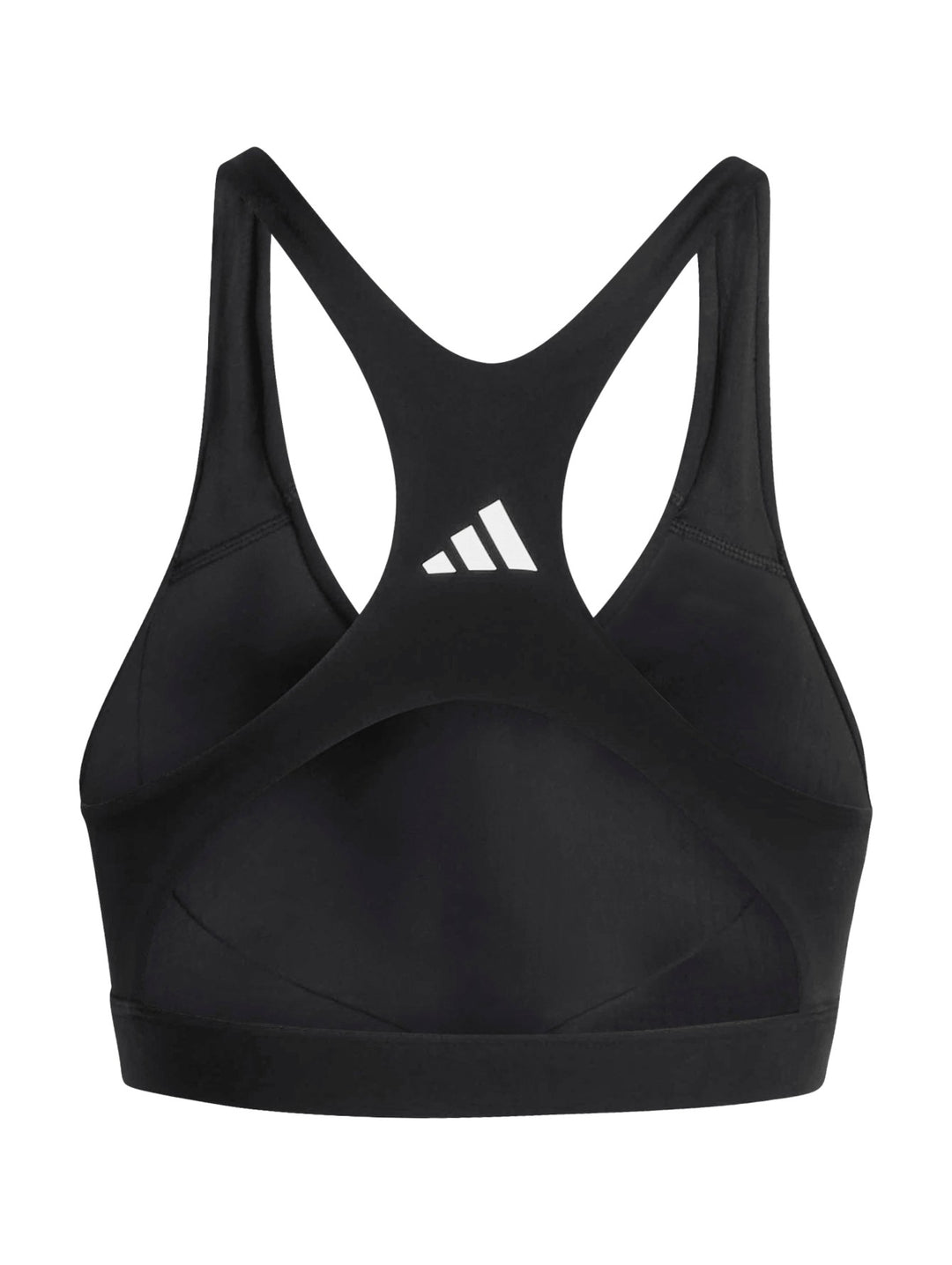 Mujer vistiendo un top deportivo corto color negro de la marca Adidas sobre fondo blanco.