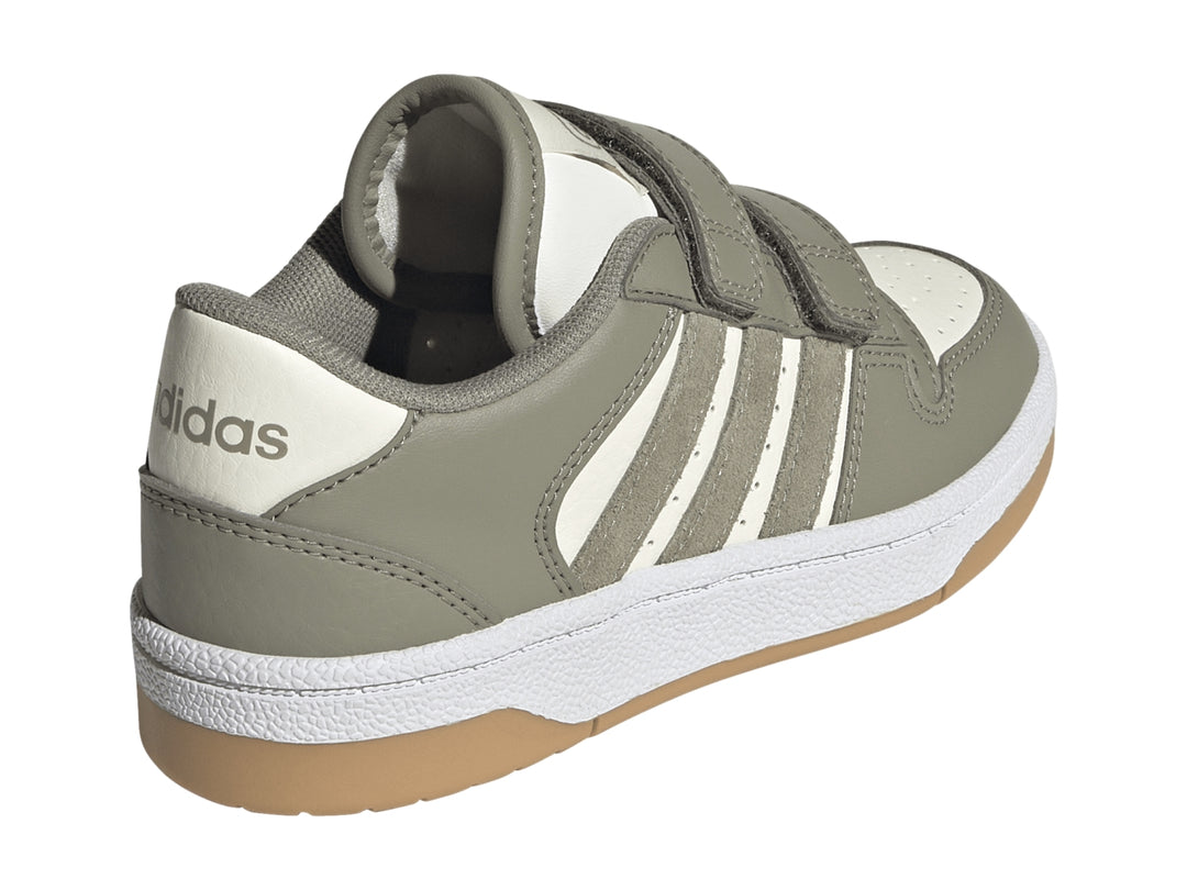 Tenis Adidas Break Start para niño en color gris con franjas blancas y cierre de velcro.