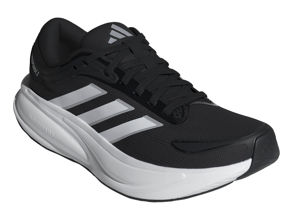 Tenis deportivos Adidas Response 2 en color negro con suela blanca y franjas laterales blancas.