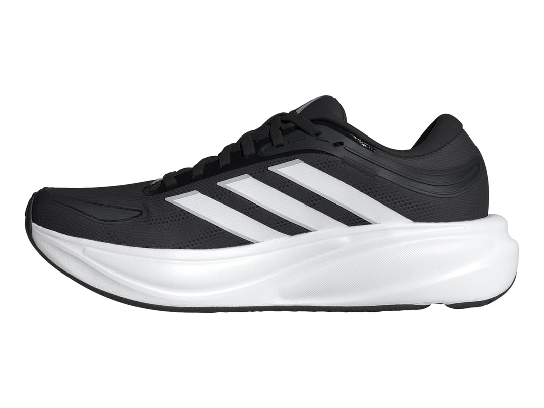 Tenis deportivos Adidas Response 2 en color negro con suela blanca y franjas laterales blancas.