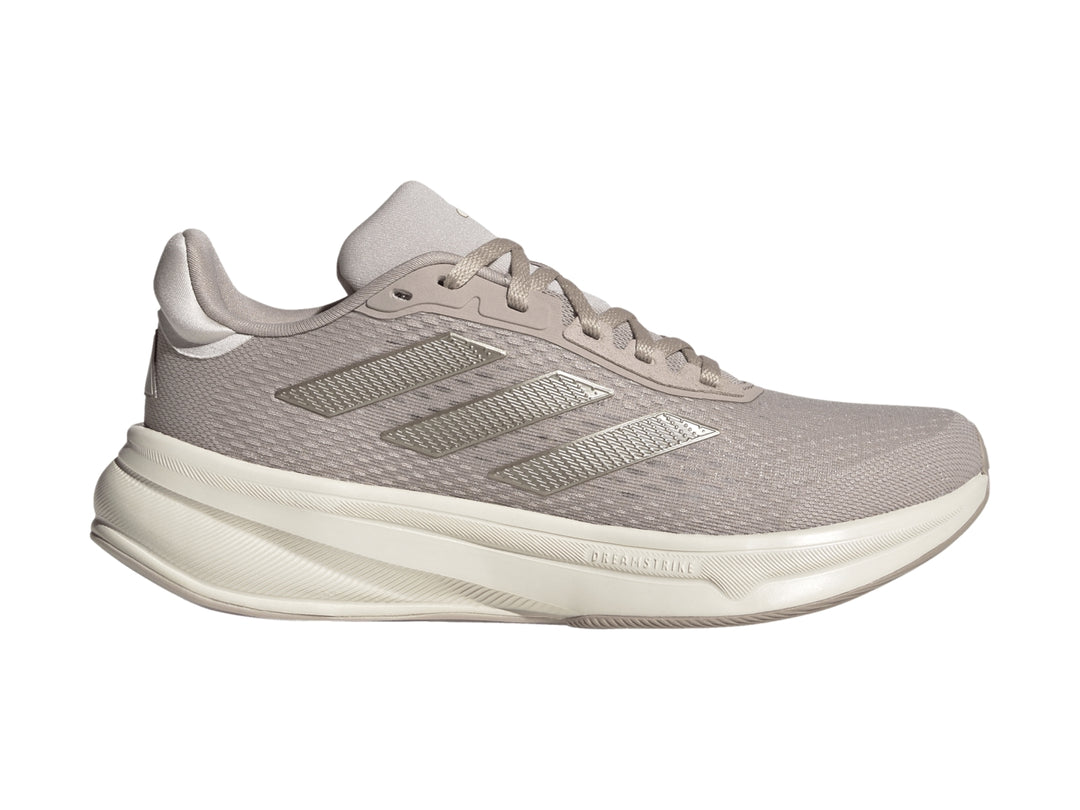 Tenis deportivos Adidas Response Super en color taupe con suela blanca y tejido transpirable.