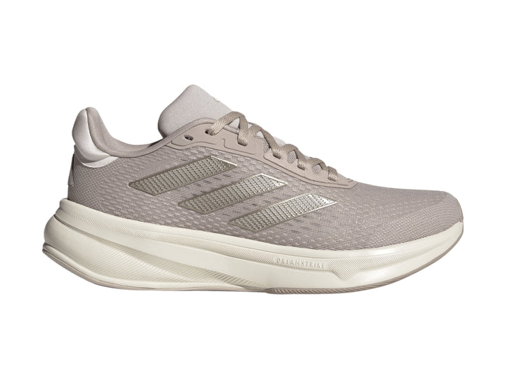 Tenis deportivos Adidas Response Super en color taupe con suela blanca y tejido transpirable.