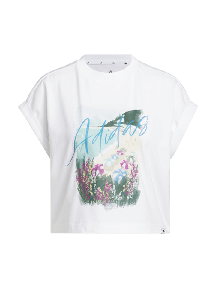 Camiseta blanca Adidas con estampado gráfico floral colorido en el frente.