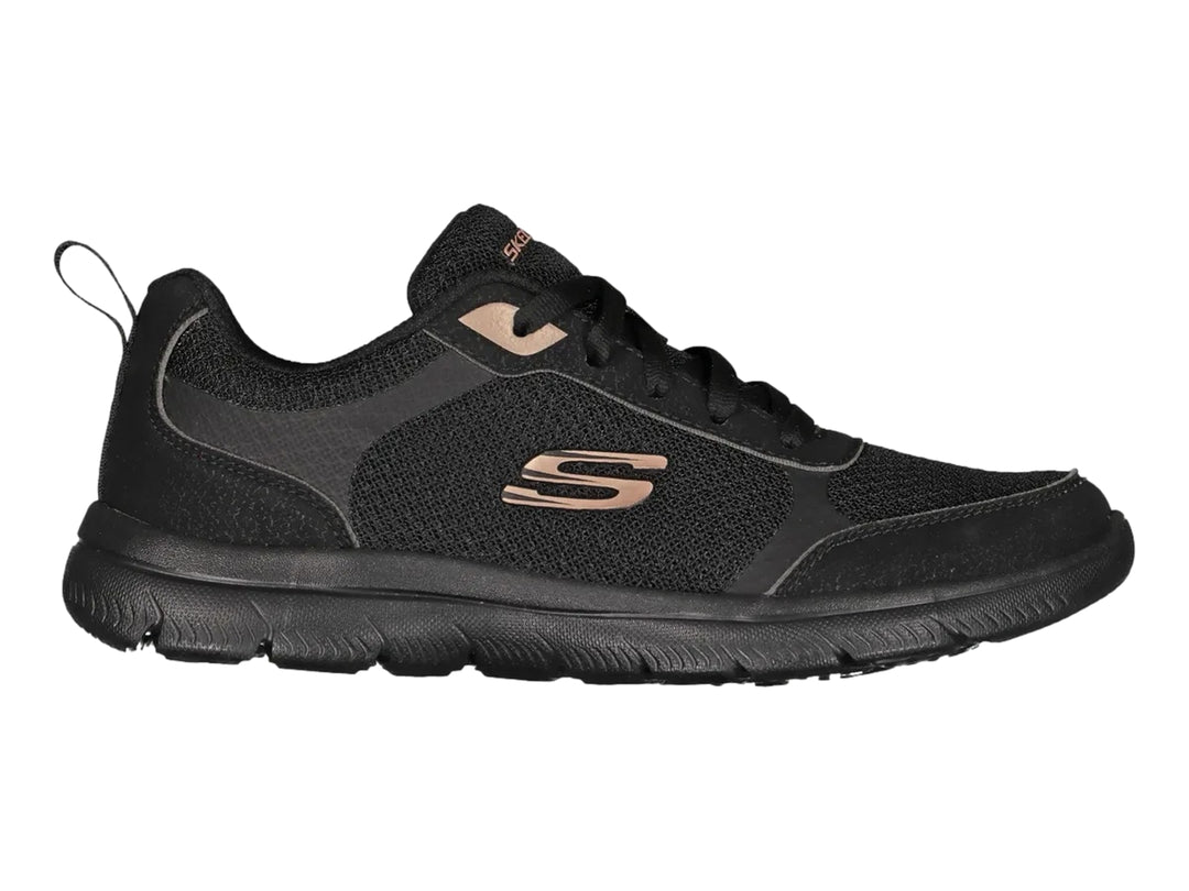 Tenis deportivos Skechers para mujer en color negro con suela flexible y detalles en tono cobre.