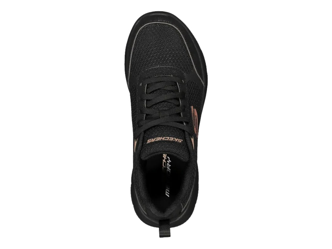 Tenis deportivos Skechers para mujer en color negro con suela flexible y detalles en tono cobre.