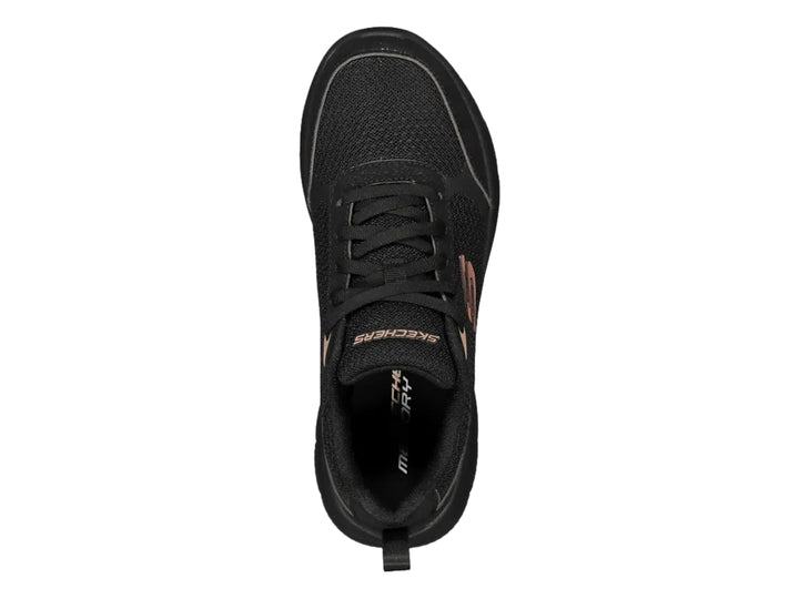 Tenis deportivos Skechers para mujer en color negro con suela flexible y detalles en tono cobre.