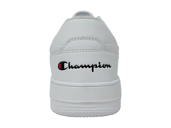 Tenis deportivos Champion color blanco para niños, con agujetas y suela plana.