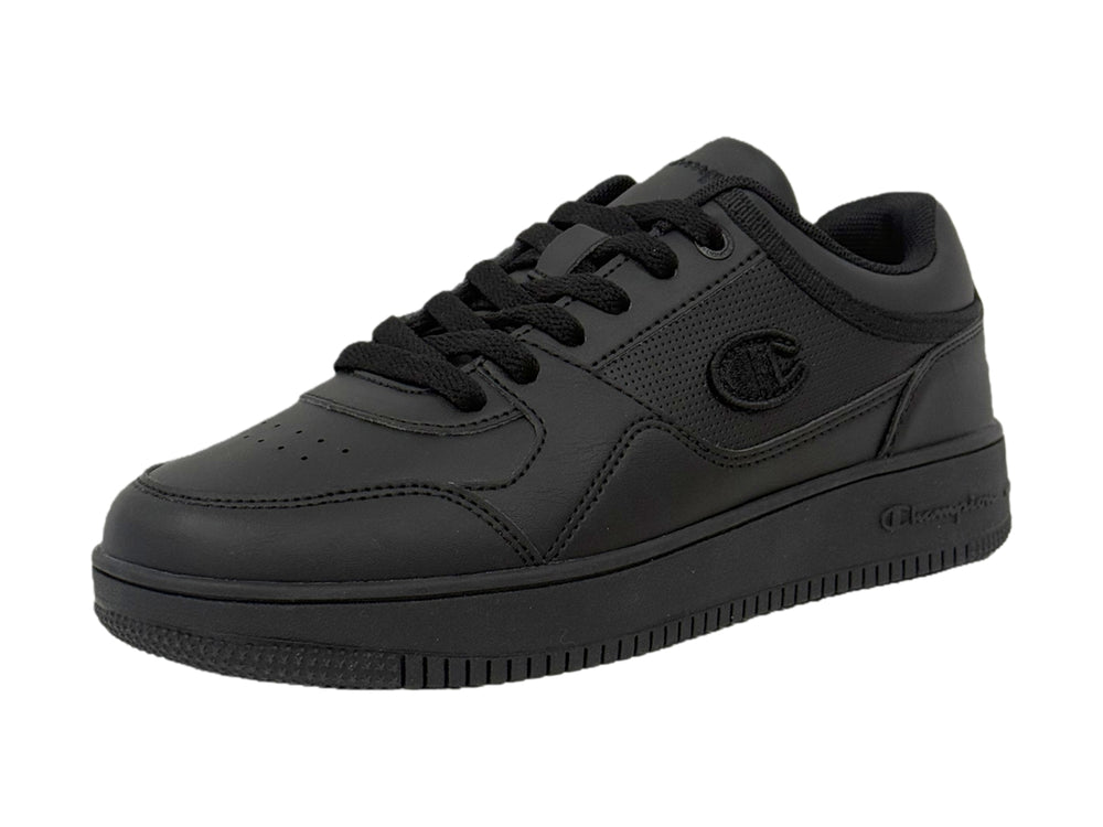 Zapatos deportivos Champion color negro sólido para niños con agujetas y suela plana.