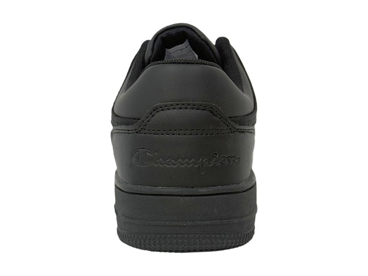 Zapatos deportivos Champion color negro sólido para niños con agujetas y suela plana.
