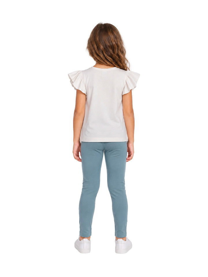 Conjunto Mayoral para niña compuesto por camiseta blanca con estampado floral y leggings color menta.