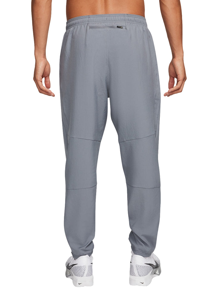 Pantalones Nike Challenger Woven Gris para Hombre