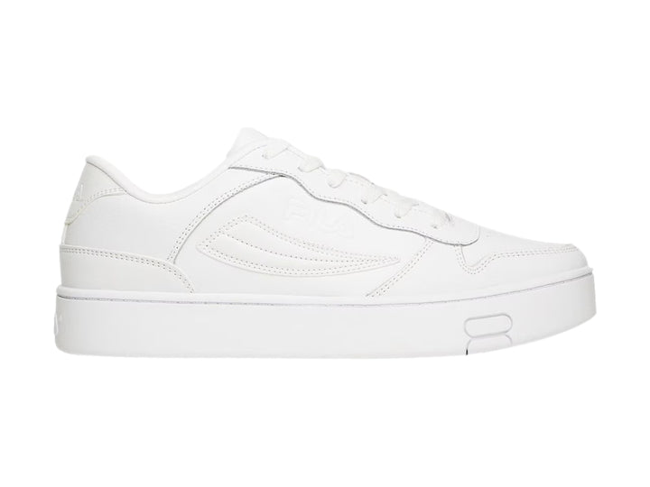 Tenis FILA color blanco total con suela ancha y diseño casual deportivo.
