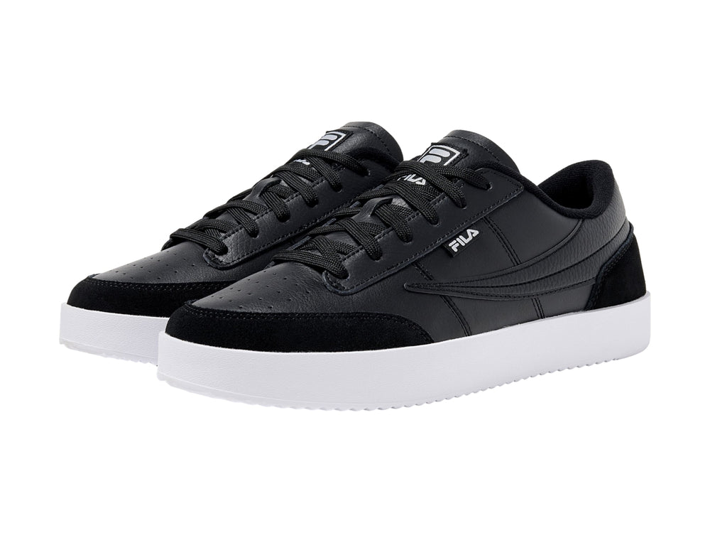 Tenis FILA color negro con suela blanca y detalles en gamuza sintética.