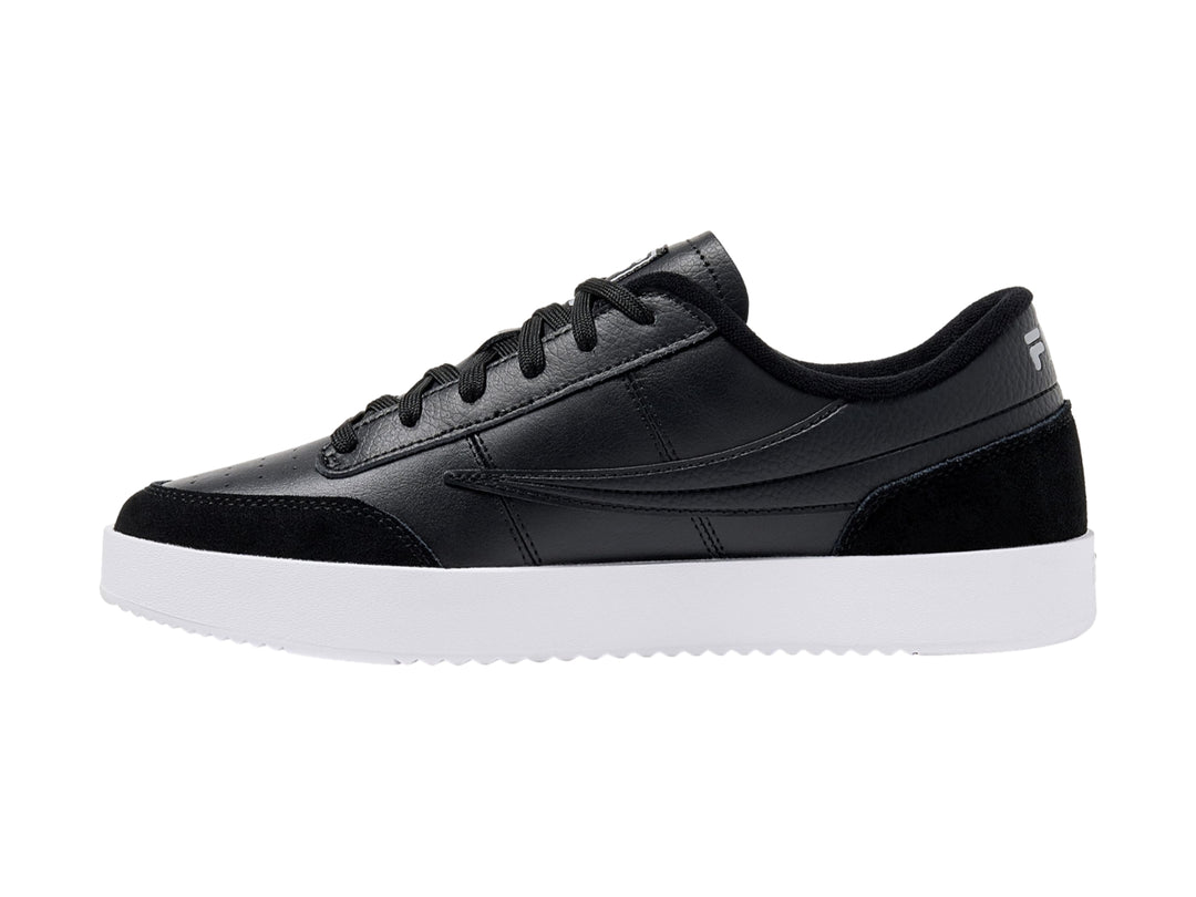 Tenis FILA color negro con suela blanca y detalles en gamuza sintética.