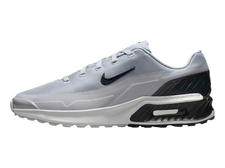 Tenis Nike Air Max color gris con detalles en negro y suela blanca.