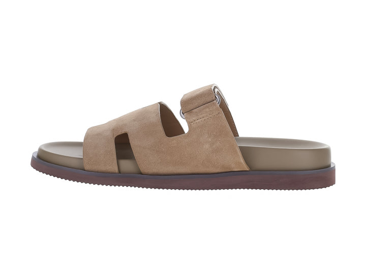 Sandalias Steve Madden Maiven en color taupe con tiras ajustables y suela de plataforma marrón.