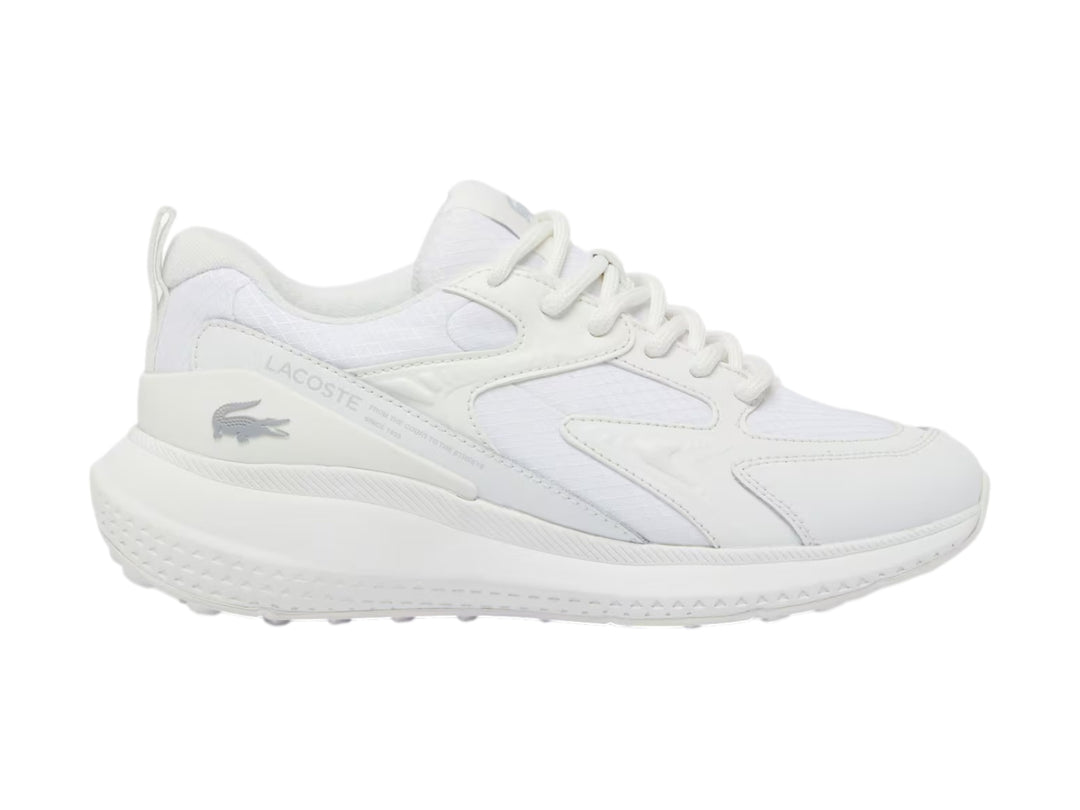 Tenis deportivos Lacoste color blanco con detalles de malla y suela blanca.