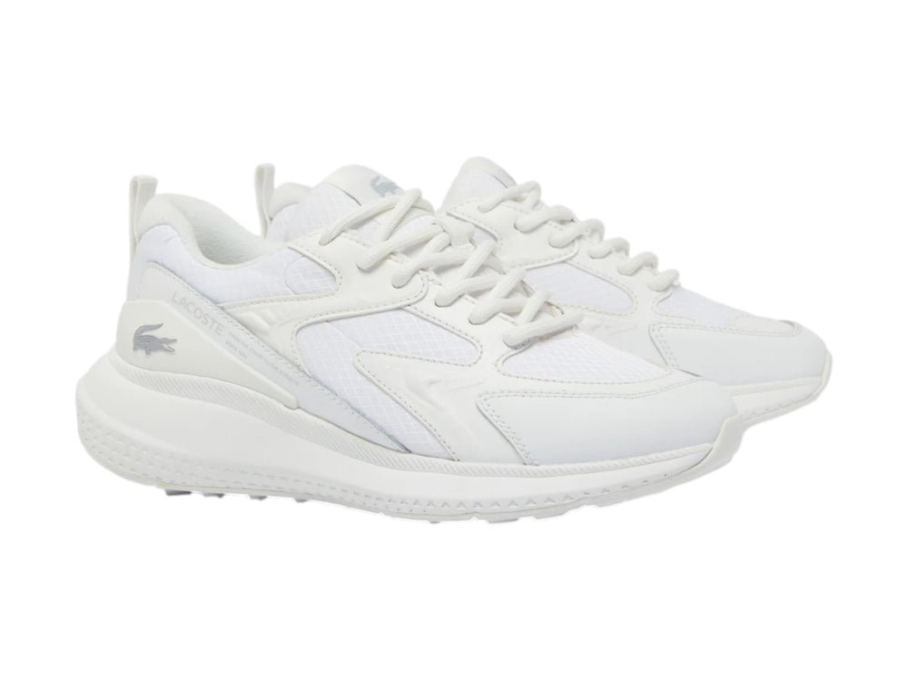 Tenis deportivos Lacoste color blanco con detalles de malla y suela blanca.