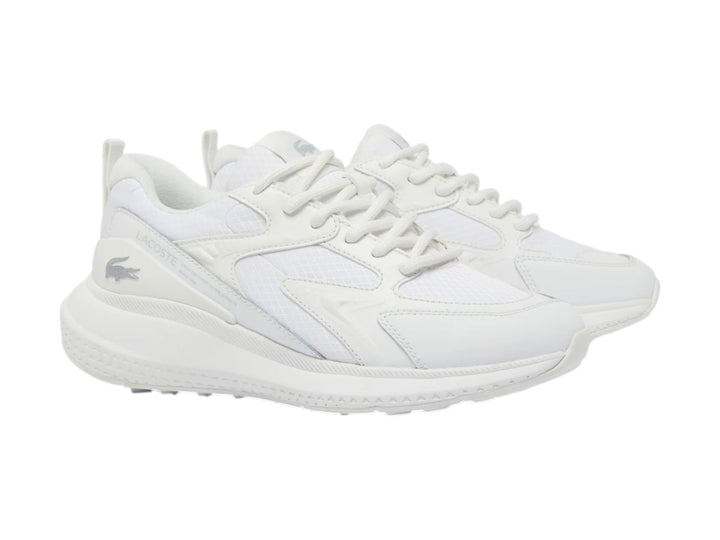 Tenis deportivos Lacoste color blanco con detalles de malla y suela blanca.