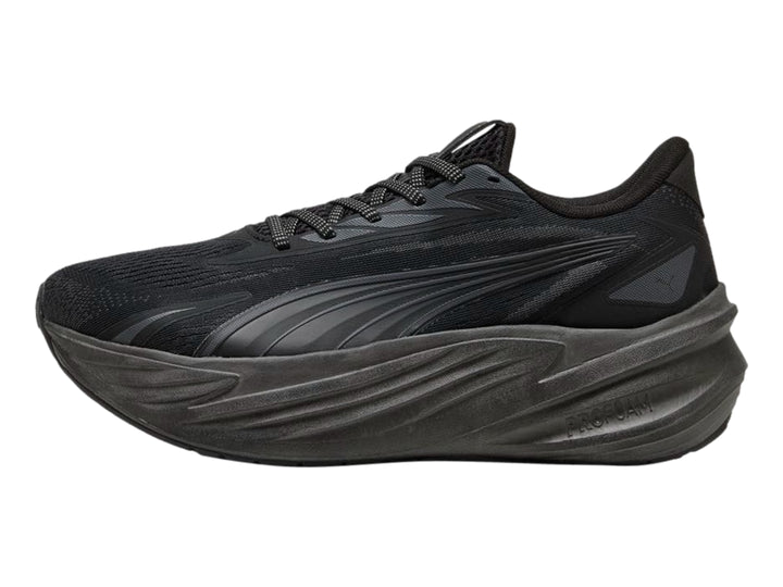 Tenis deportivos PUMA Maxima Pro color negro con suela gruesa y diseño moderno.