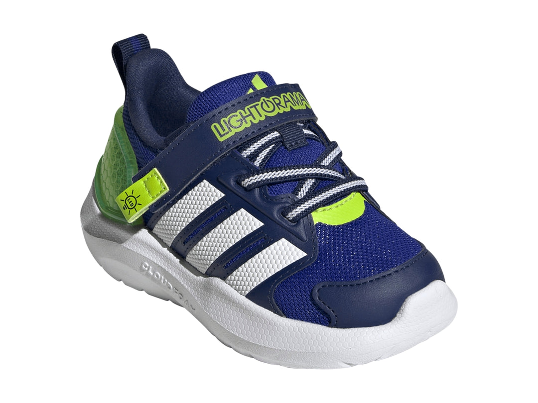Tenis Adidas Lightorama en color azul con tres franjas blancas y detalles en verde neón sobre suela blanca.