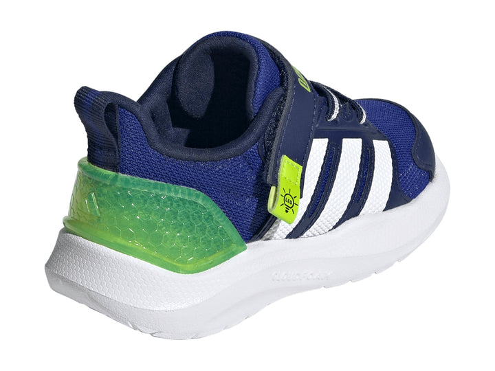 Tenis Adidas Lightorama en color azul con tres franjas blancas y detalles en verde neón sobre suela blanca.