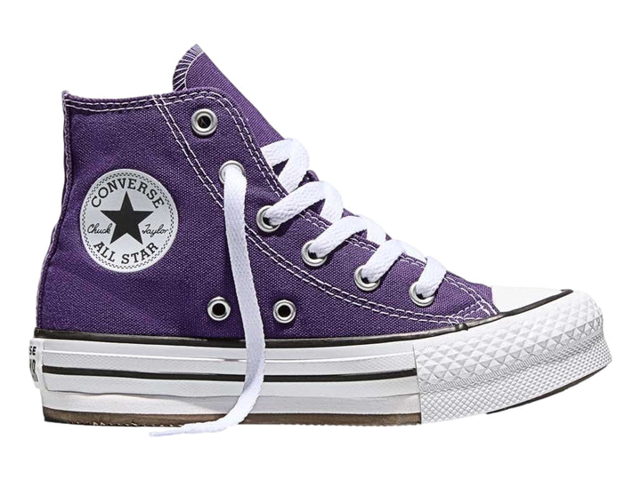 Tenis Converse de bota color morado con suela de plataforma blanca.