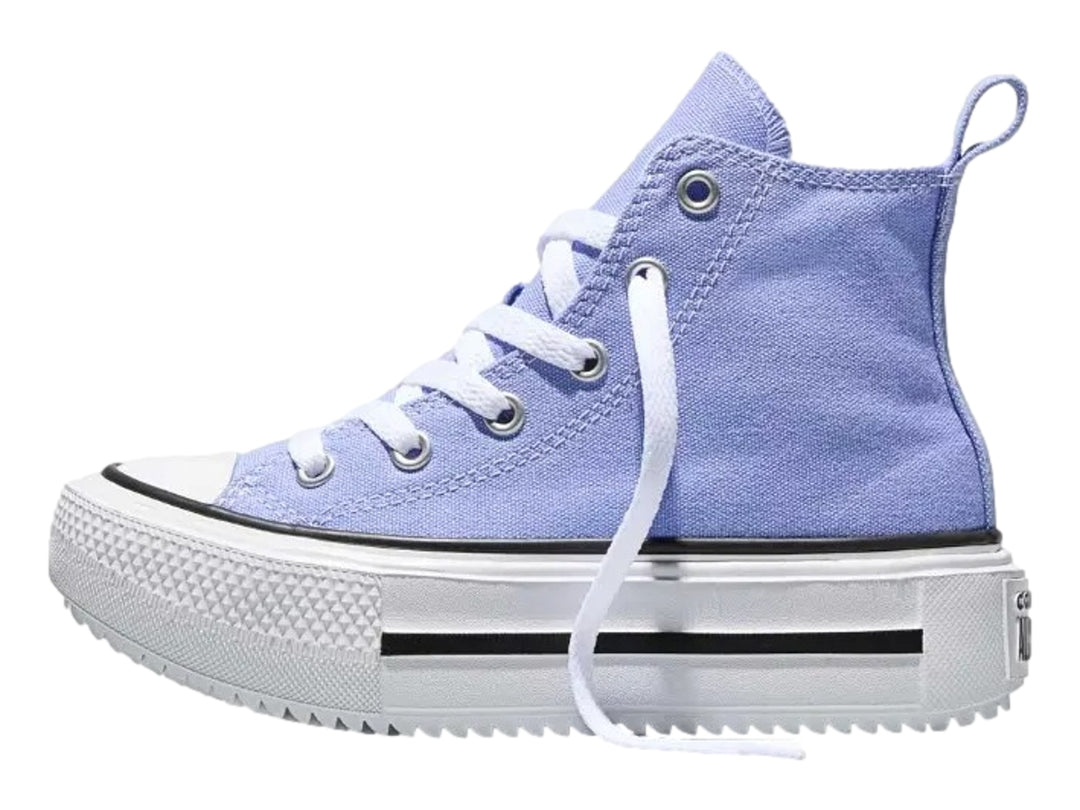 Tenis Converse de bota alta en color lila con suela de plataforma blanca y detalles en negro.