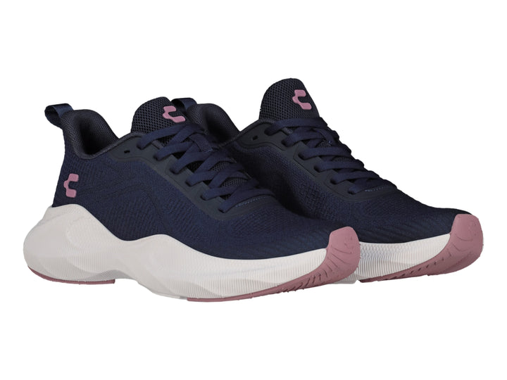 Tenis deportivos Charly color azul marino con suela blanca gruesa y detalles en rosa.