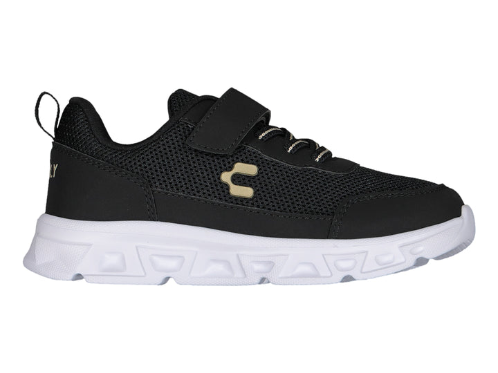 Tenis deportivos Charly color negro con suela blanca y correa de velcro.