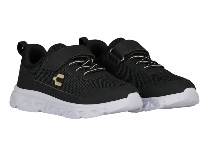 Tenis deportivos Charly color negro con suela blanca y correa de velcro.