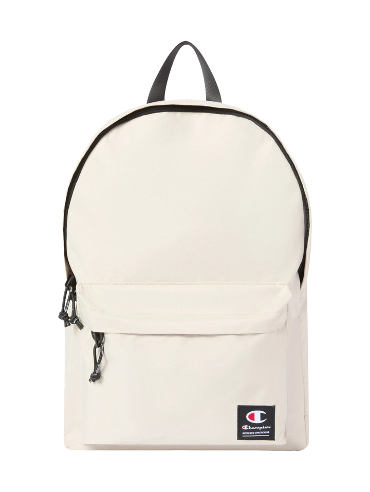 Mochila escolar Champion color beige con detalles en negro y logotipo frontal.