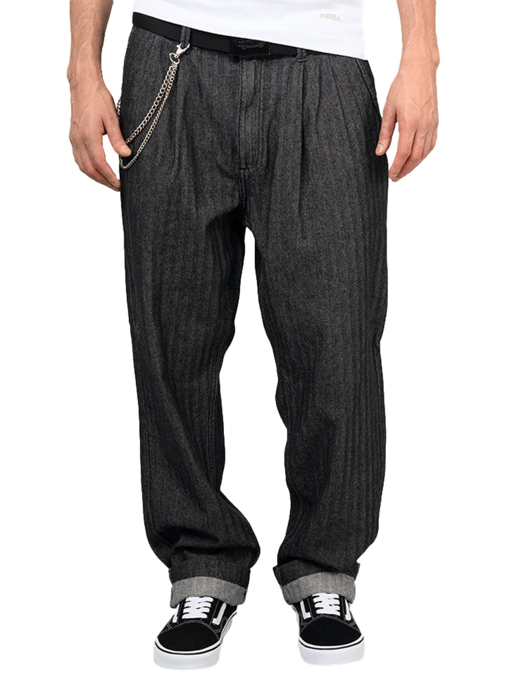 Pantalones Vans Authentic Chino Loose Tapered en color negro rinse con textura de espiga y corte holgado.