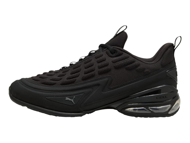 Tenis PUMA color negro con detalles en gris oscuro y cámara de aire visible en el talón.