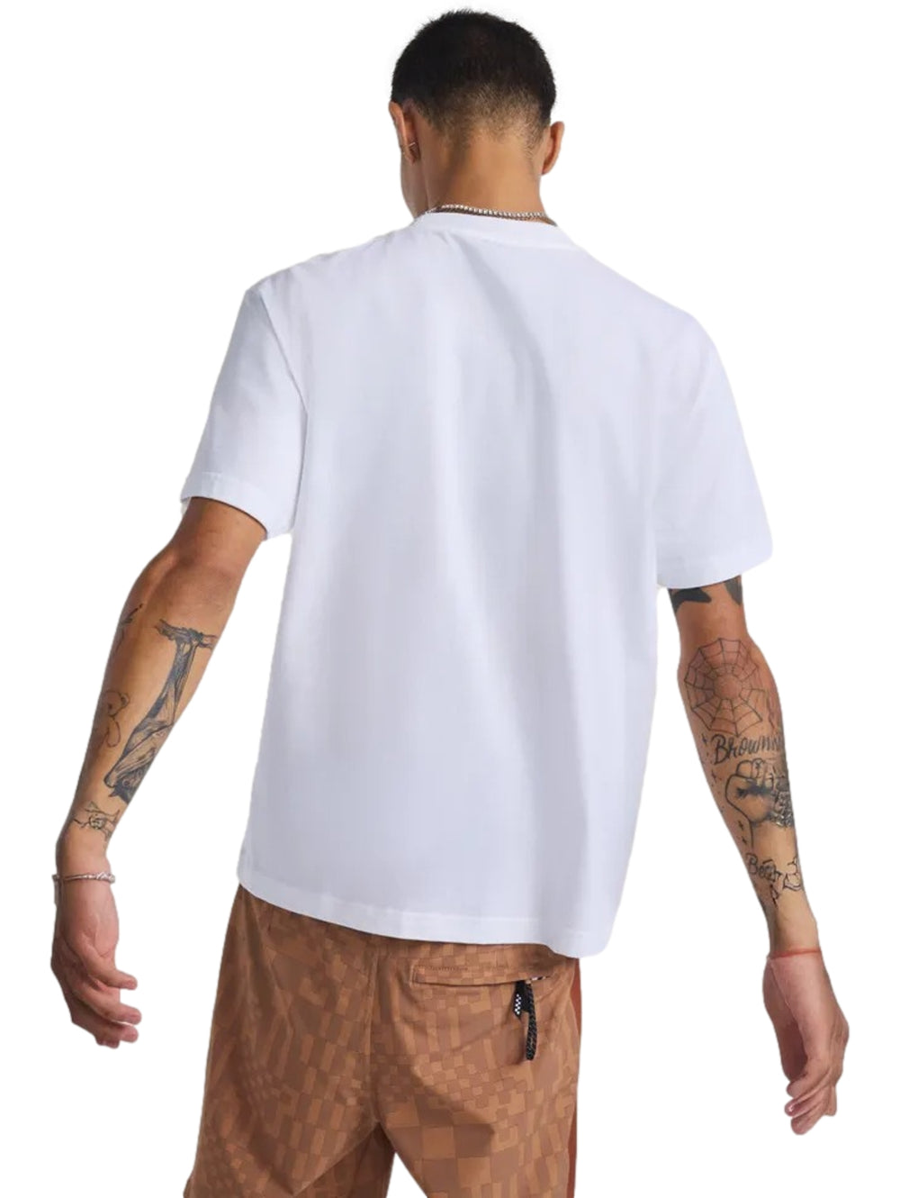Camiseta blanca de manga corta marca Vans con estampado frontal de un perro naranja sobre el logo de la marca.
