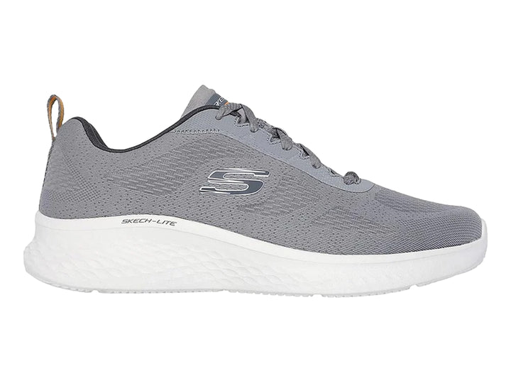Tenis deportivos Skechers color gris con suela blanca y agujetas, vista lateral.