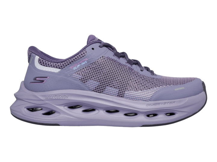 Tenis deportivos Skechers color morado con suela Glide Step y tejido de malla.