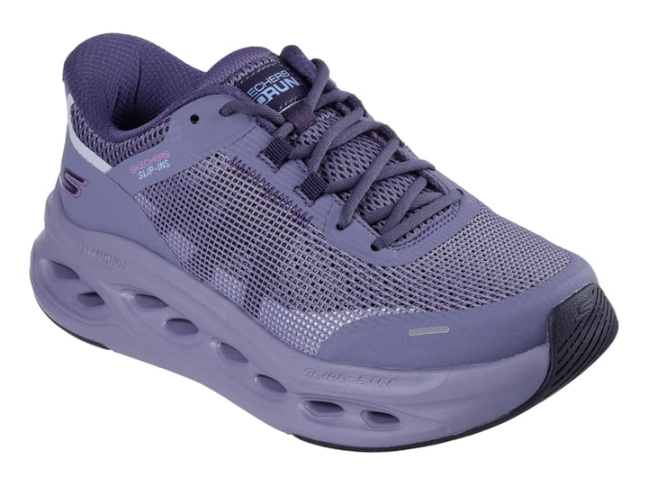 Tenis deportivos Skechers color morado con suela Glide Step y tejido de malla.