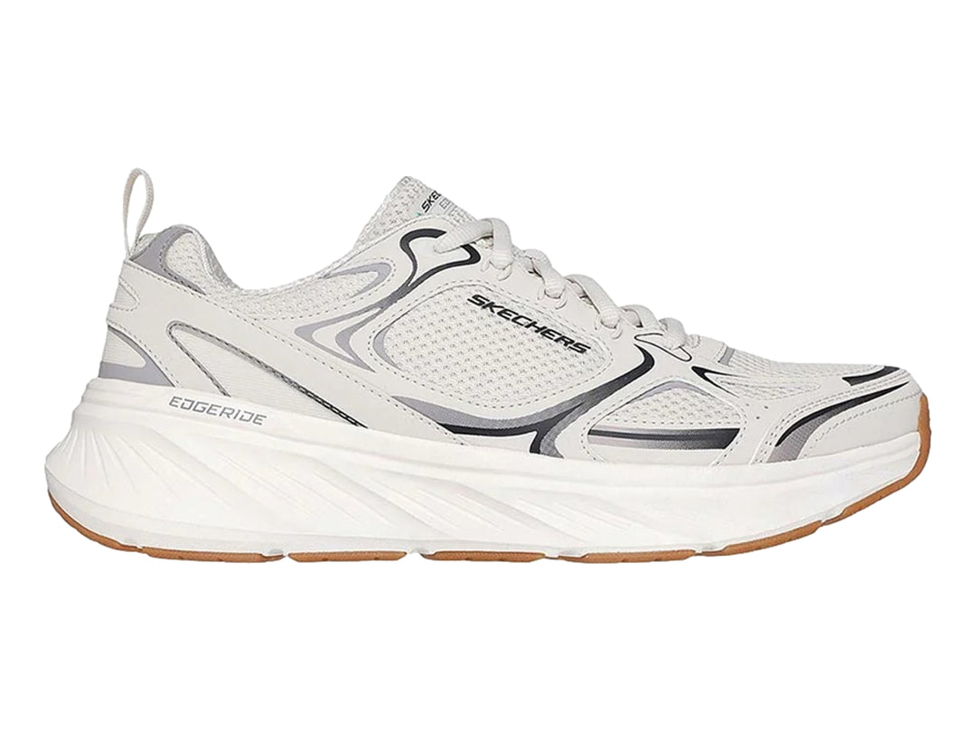 Tenis deportivos Skechers color blanco con detalles en gris y suela color café.