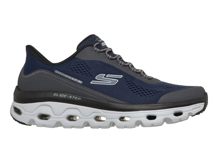 Tenis Skechers color azul marino con detalles en gris y suela blanca Glide-Step para hombre.