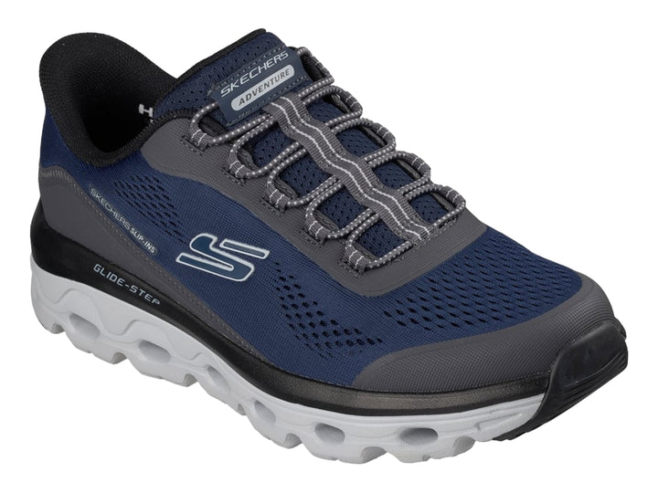 Tenis Skechers color azul marino con detalles en gris y suela blanca Glide-Step para hombre.