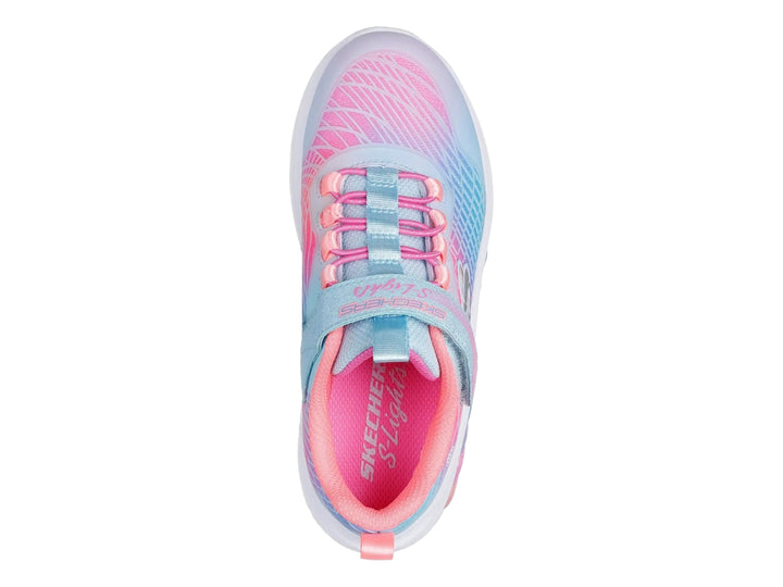 Tenis deportivos Skechers para niña con colores degradados rosa, azul y morado y suela blanca.
