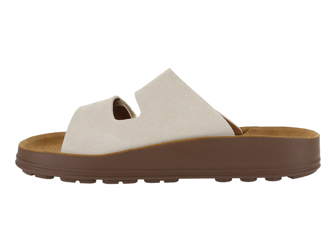 Sandalias Nomadas color beige con suela marrón y dos correas ajustables.