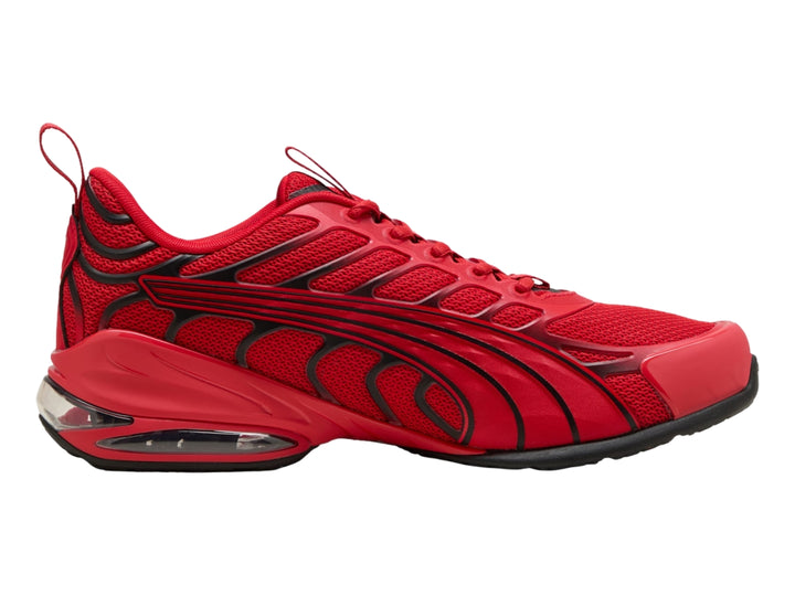 Tenis deportivos PUMA en color rojo con detalles negros y suela amortiguada.