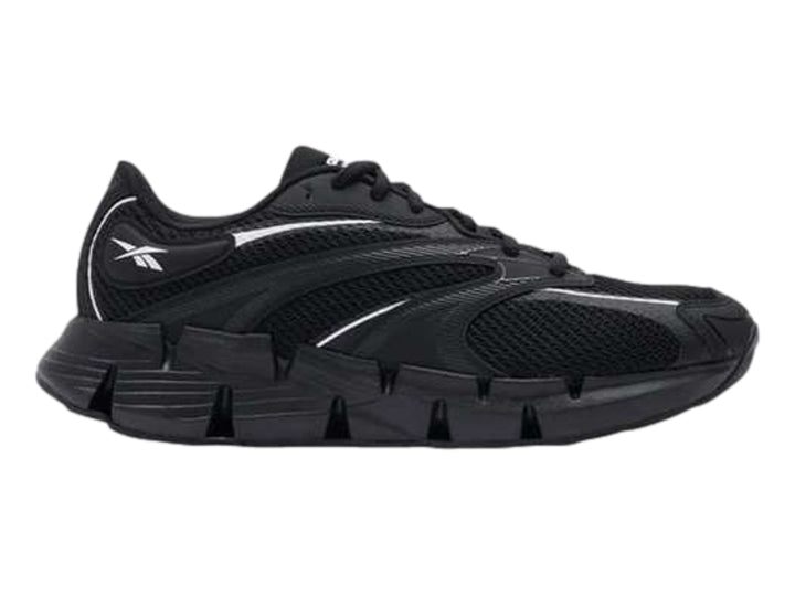 Tenis deportivos Reebok Zig Hypnotica color negro con suela esculpida y detalles en blanco.