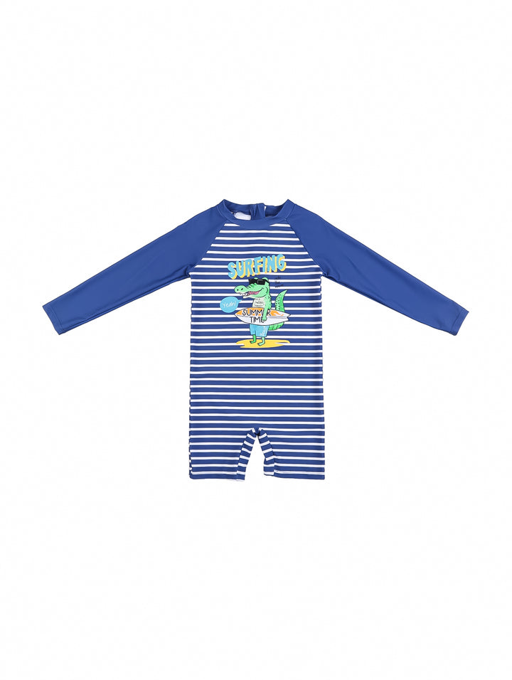 Traje de baño de una pieza para niño color azul marino con mangas largas, rayas blancas y dibujo de dinosaurio.