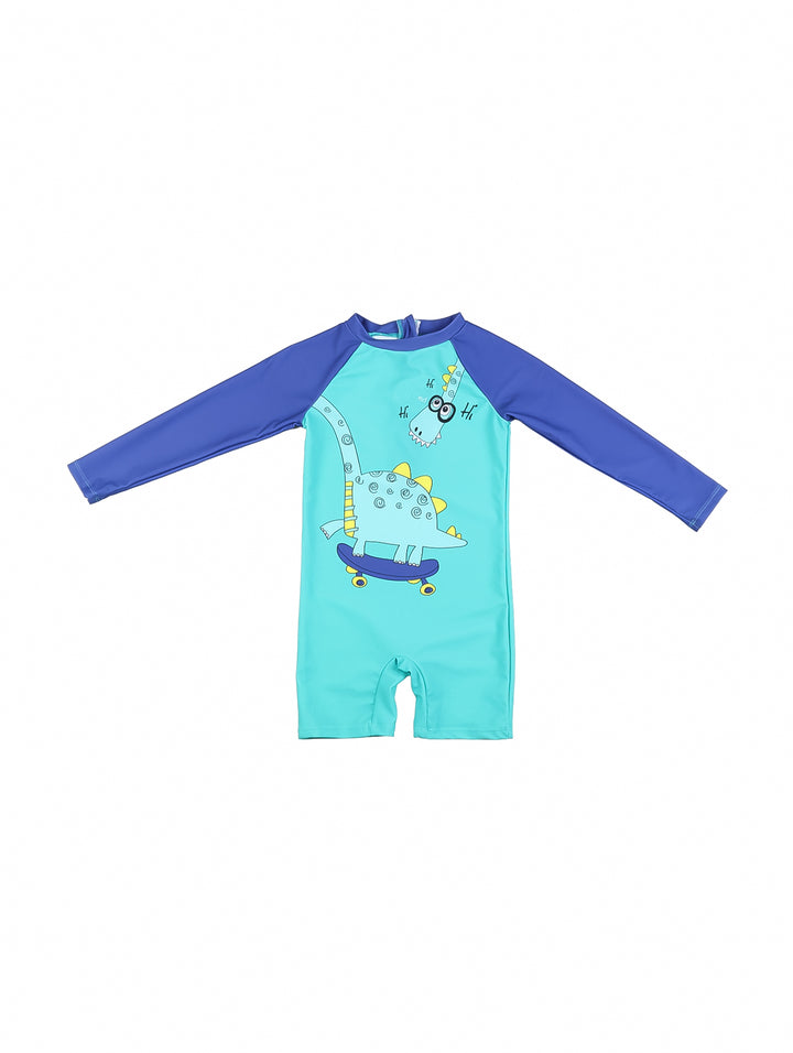 Traje de baño de una pieza para niño, color turquesa y azul, con dibujo de dinosaurio sobre una patineta.