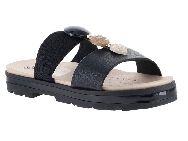 Sandalias negras de plataforma con suela dentada y plantillas beige.