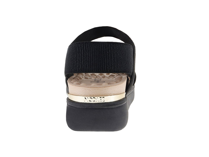 Sandalia de confort color negro con plantilla beige y tiras anchas elásticas.