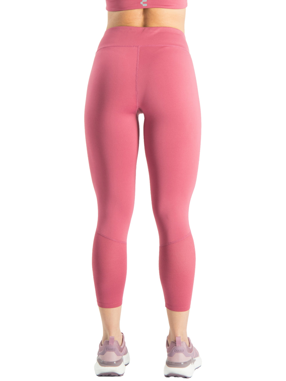 Leggings deportivos ajustados de color rosa para mujer.
